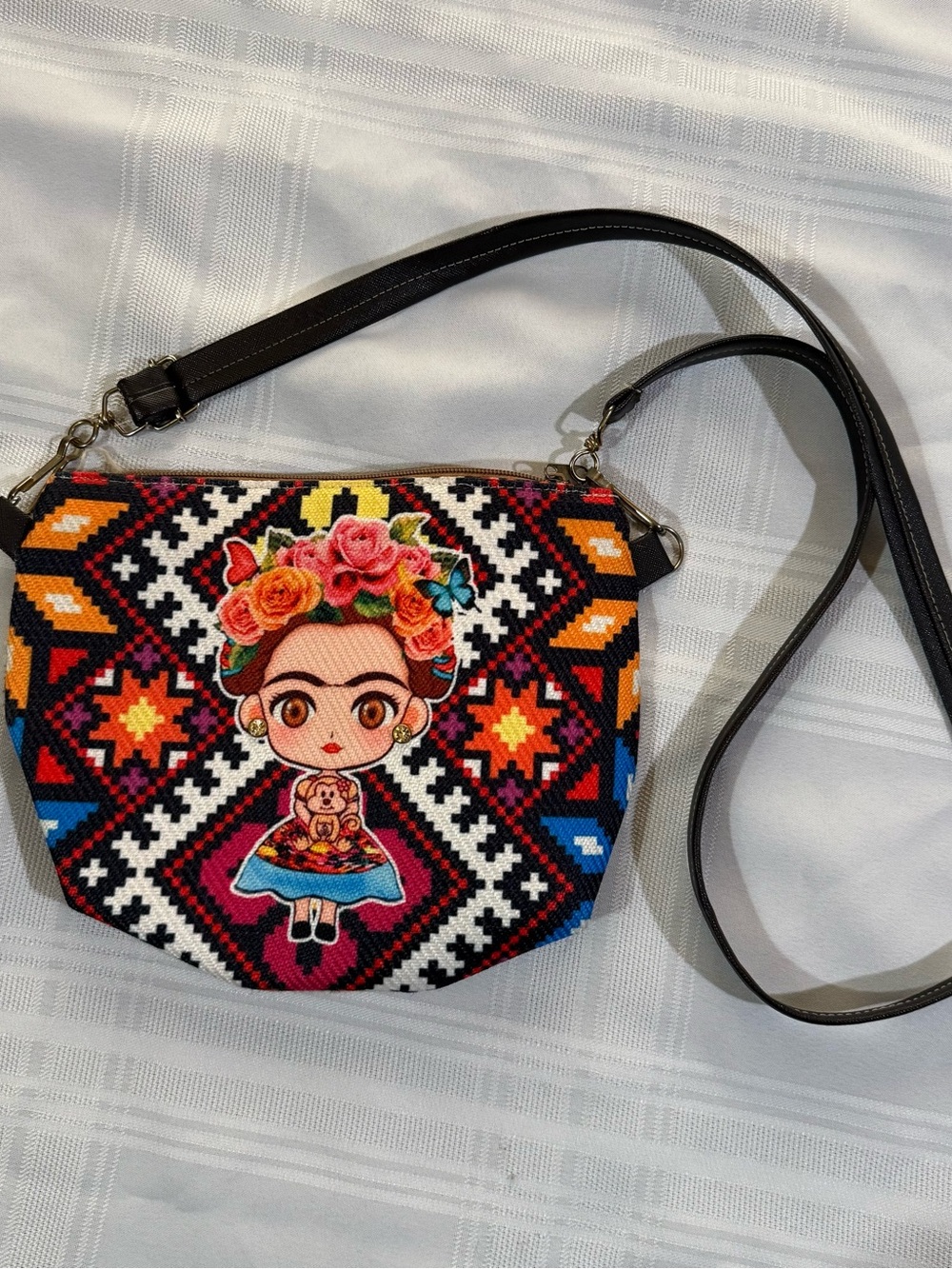 Frida Kahlo Crossbody Bag. 9 inches wide and 7.5 inches high.